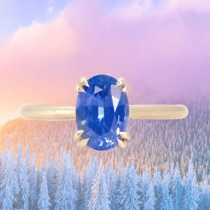 1.81ct Opalescent Oval Blue Sapphire Hidden Halo Solitaire in Satin Finished 14k Yellow Gold